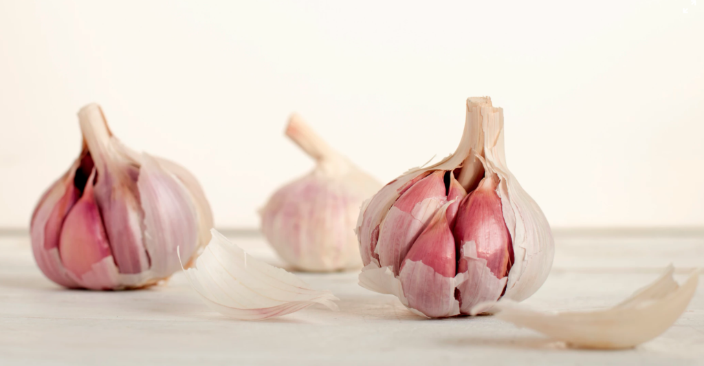 three bulbs of garlic