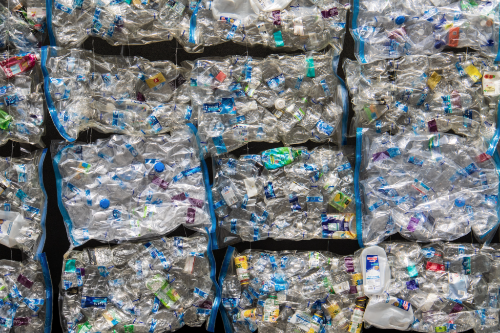 cubes of crush plastic showing the huge quantity of plastic pollution.