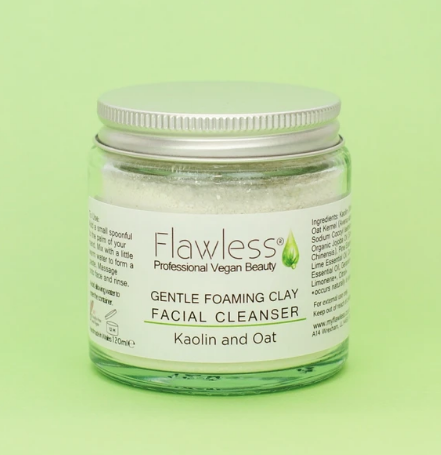 Flawless gentle foaming facial cleanser against a green background