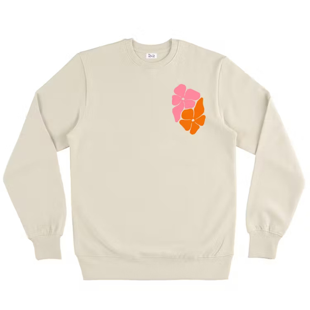 Sand sweater with orange and pick flower emblem