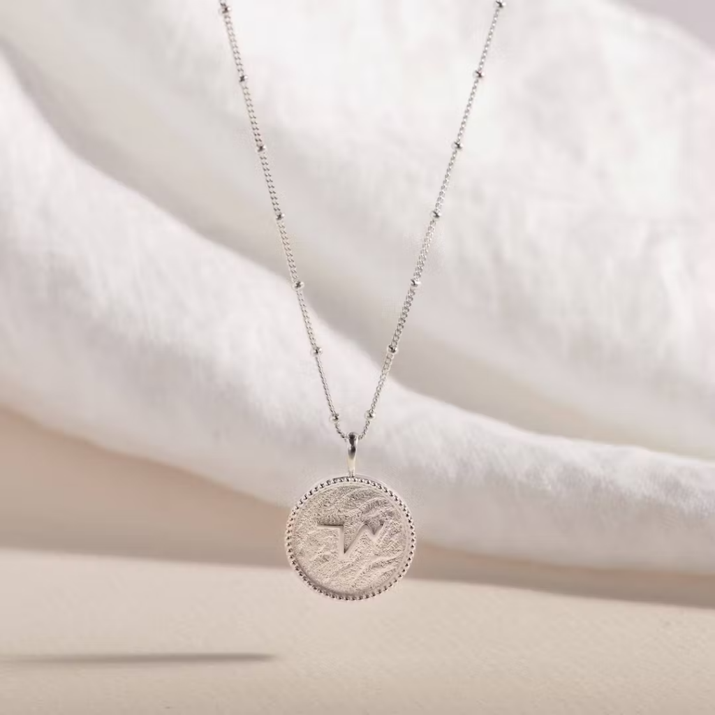thrive silver necklace